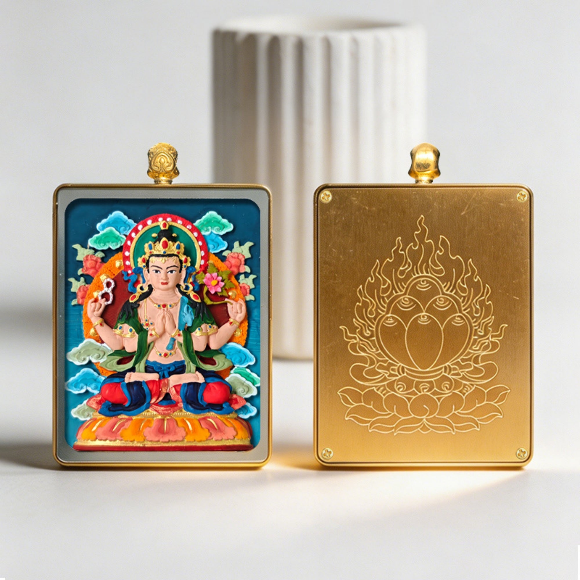 Two decorative plaques, one with a colorful figure and the other with a gold emblem, on a light background.