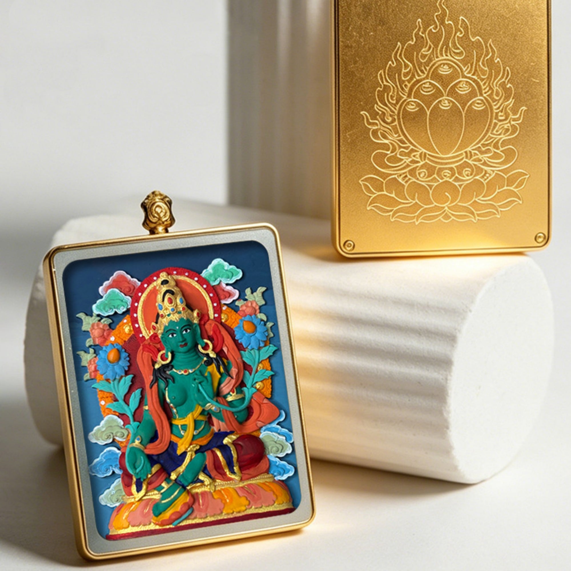 Colorful religious icon in a gold frame with a white and gold background