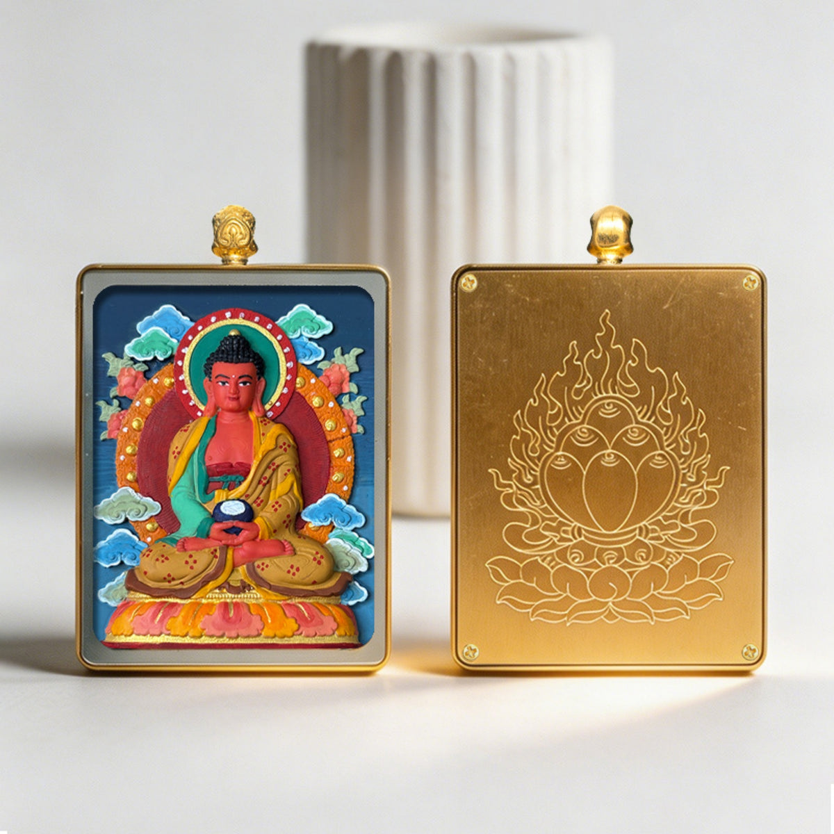 Two decorative panels, one with a colorful religious figure and the other with a gold emblem, on a light background.