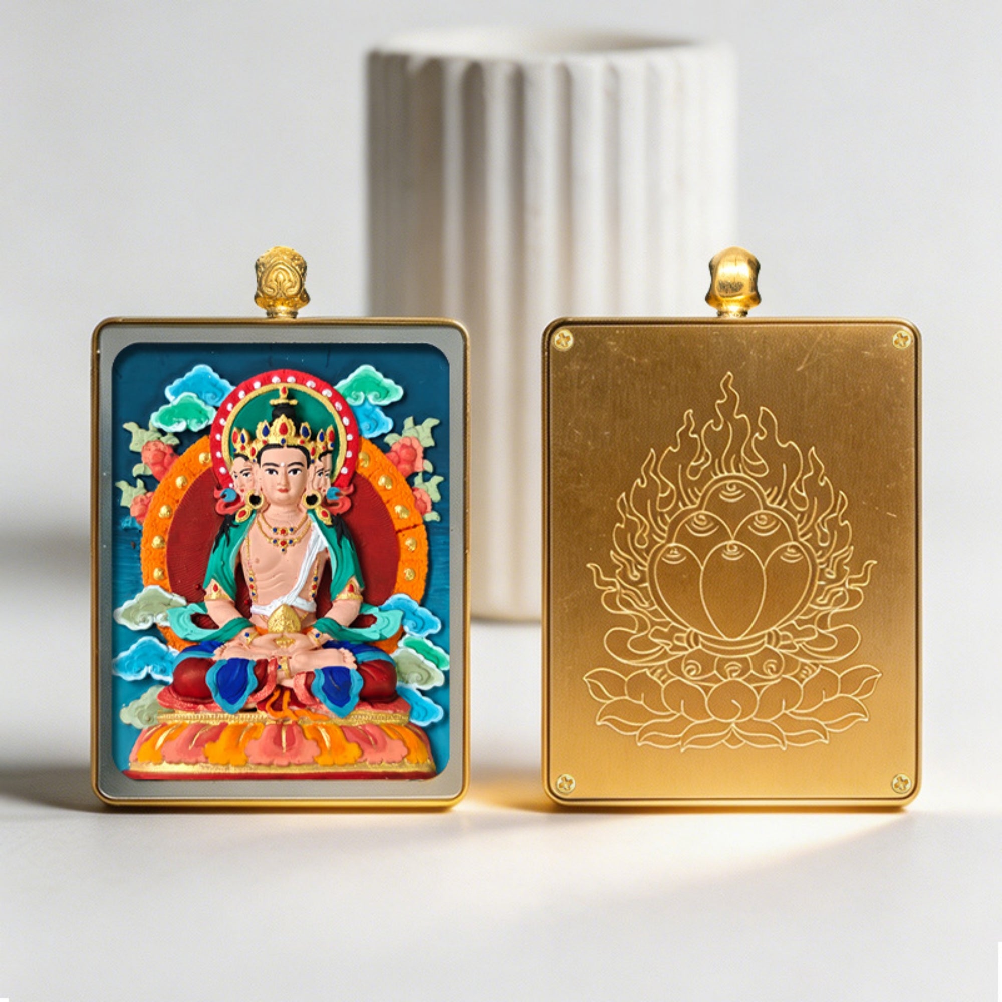 Two decorative plaques, one with a colorful religious figure and the other with a gold emblem, on a light background.