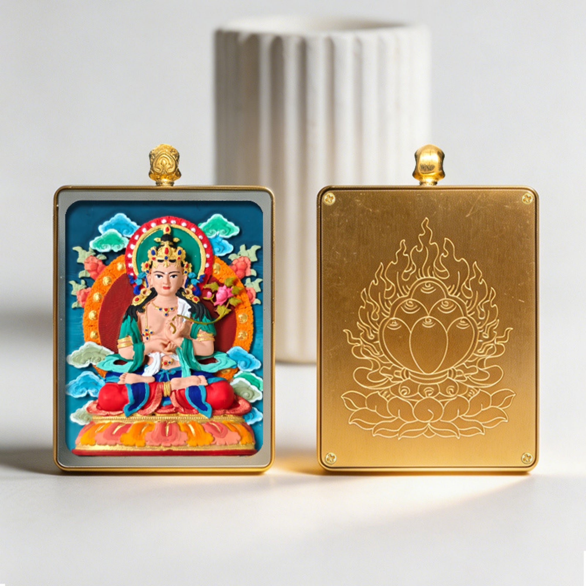 Two decorative panels, one with a colorful deity illustration and the other with a gold emblem, on a light background.