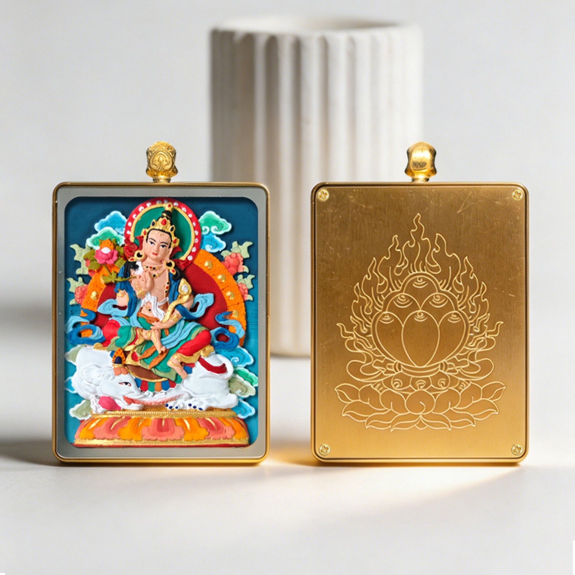 Two decorative panels, one with a colorful deity illustration and the other with a gold emblem, on a light background.
