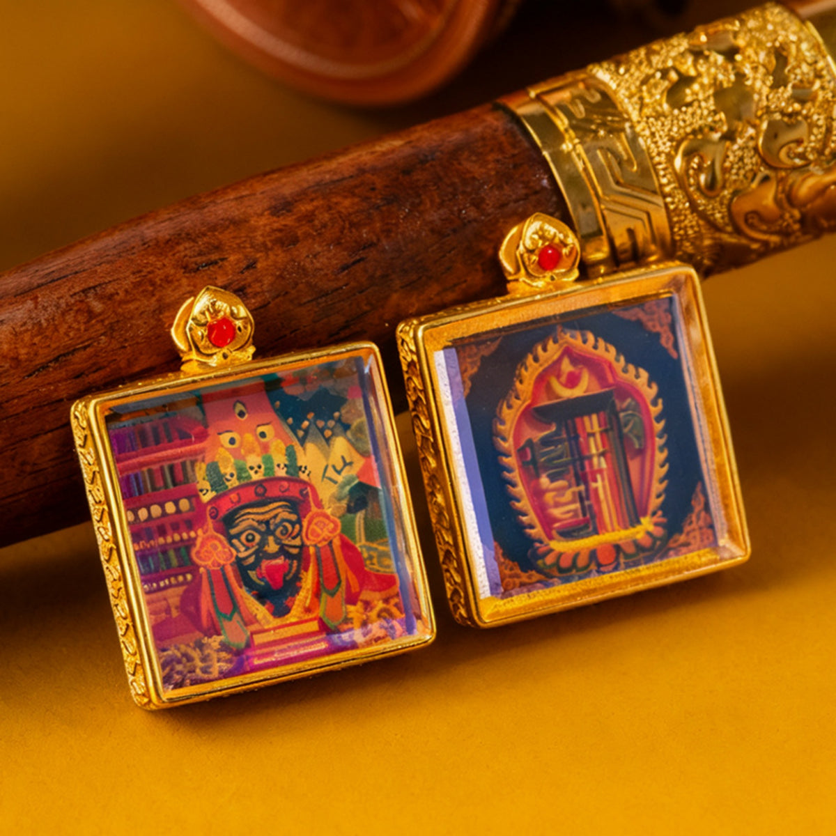 Decorative earrings with colorful designs on a wooden stick against a yellow background