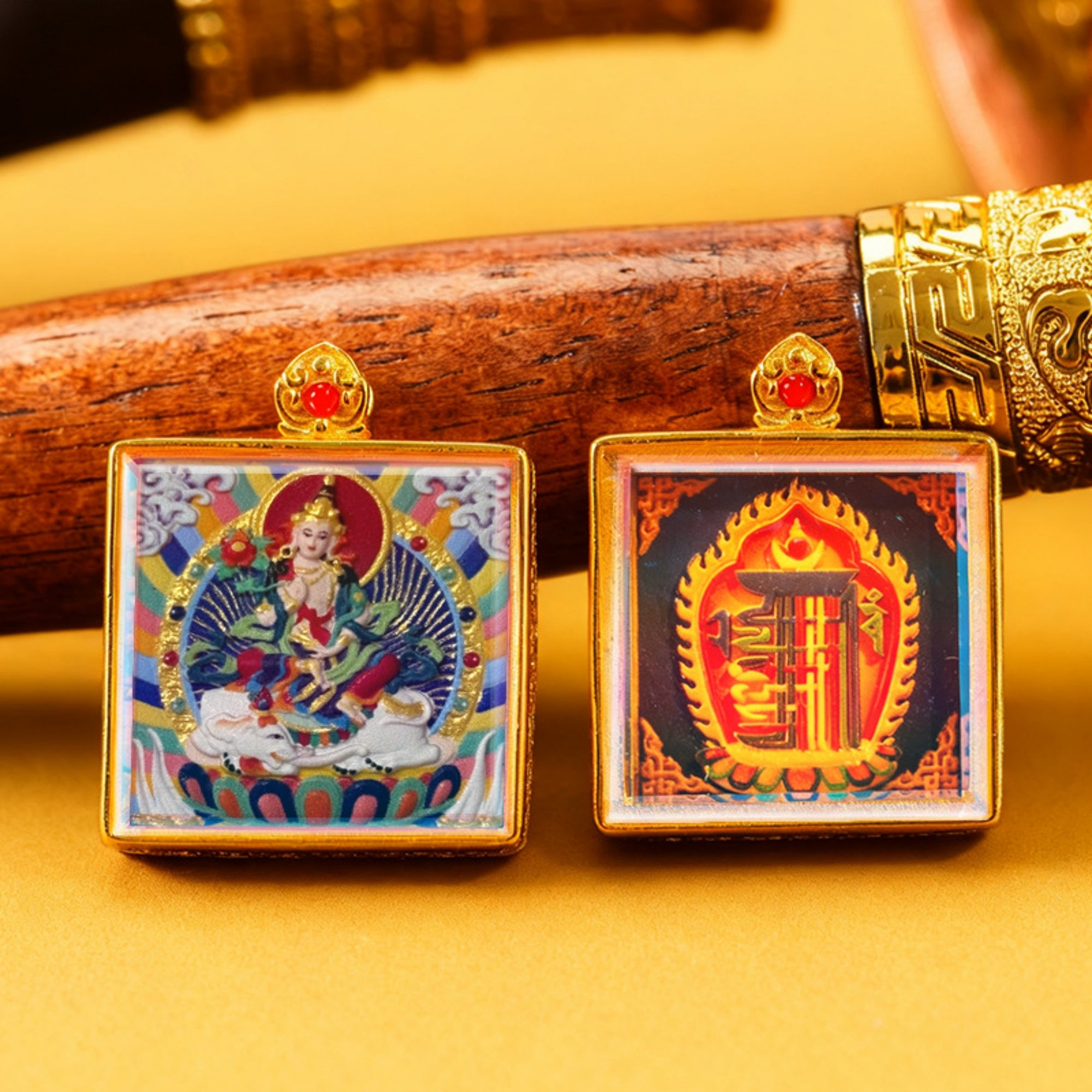 Two square decorative items with intricate designs on a yellow background