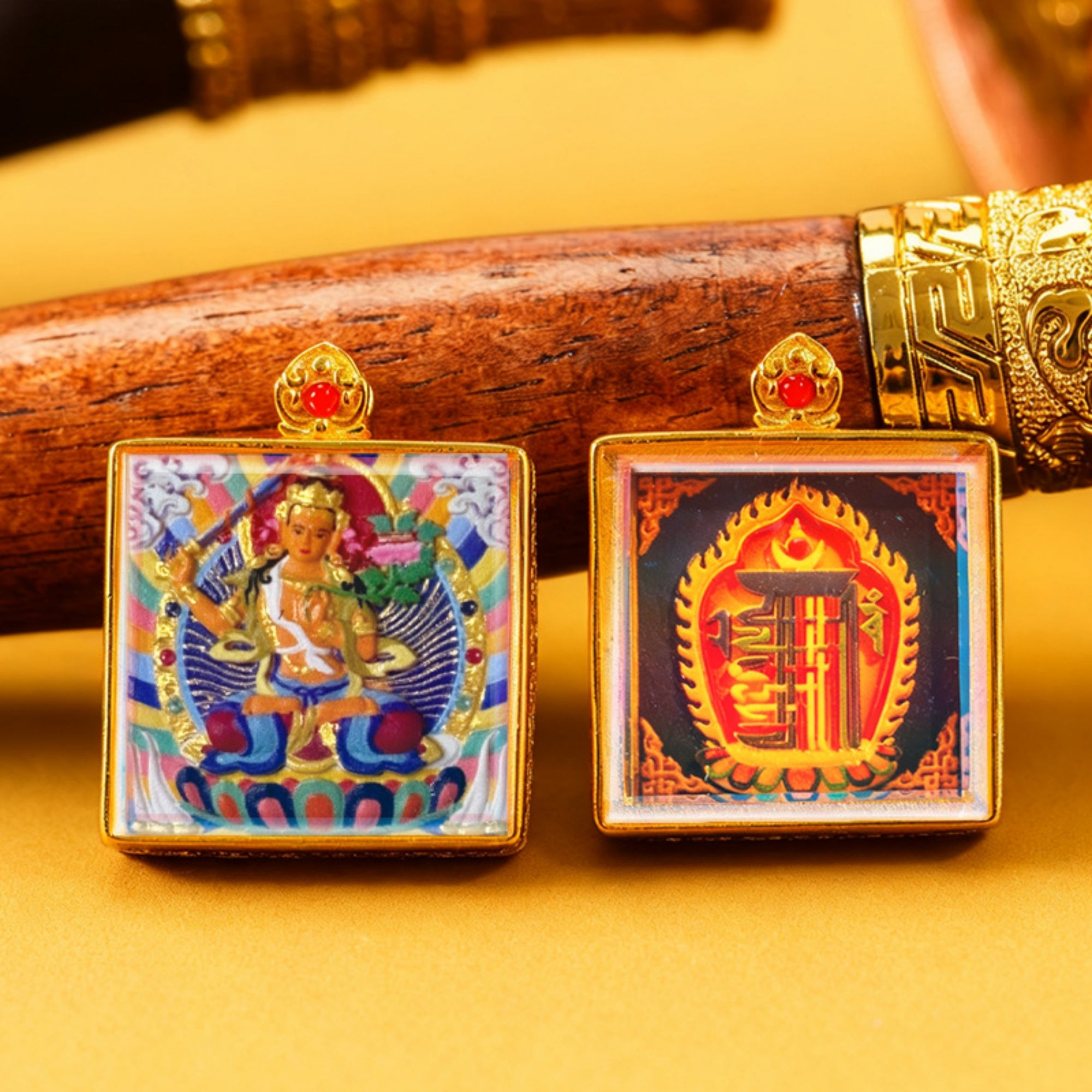 Two square decorative items with intricate designs on a yellow background